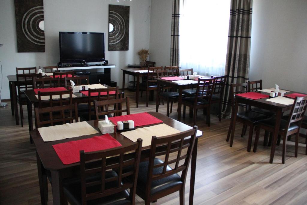TV a/nebo společenská místnost v ubytování Hotel Grig