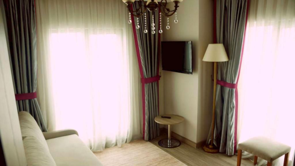 TV a/nebo společenská místnost v ubytování Dab Hotel