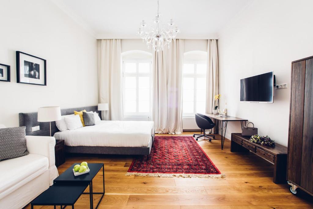 Posteľ alebo postele v izbe v ubytovaní Adele Apartments