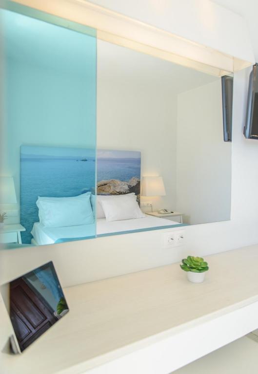 TV a/nebo společenská místnost v ubytování Sun Rise Hotel