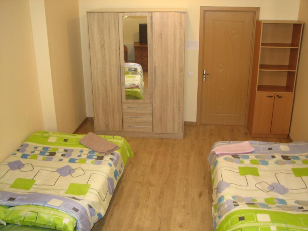 Postel nebo postele na pokoji v ubytování Little Amber Apartments
