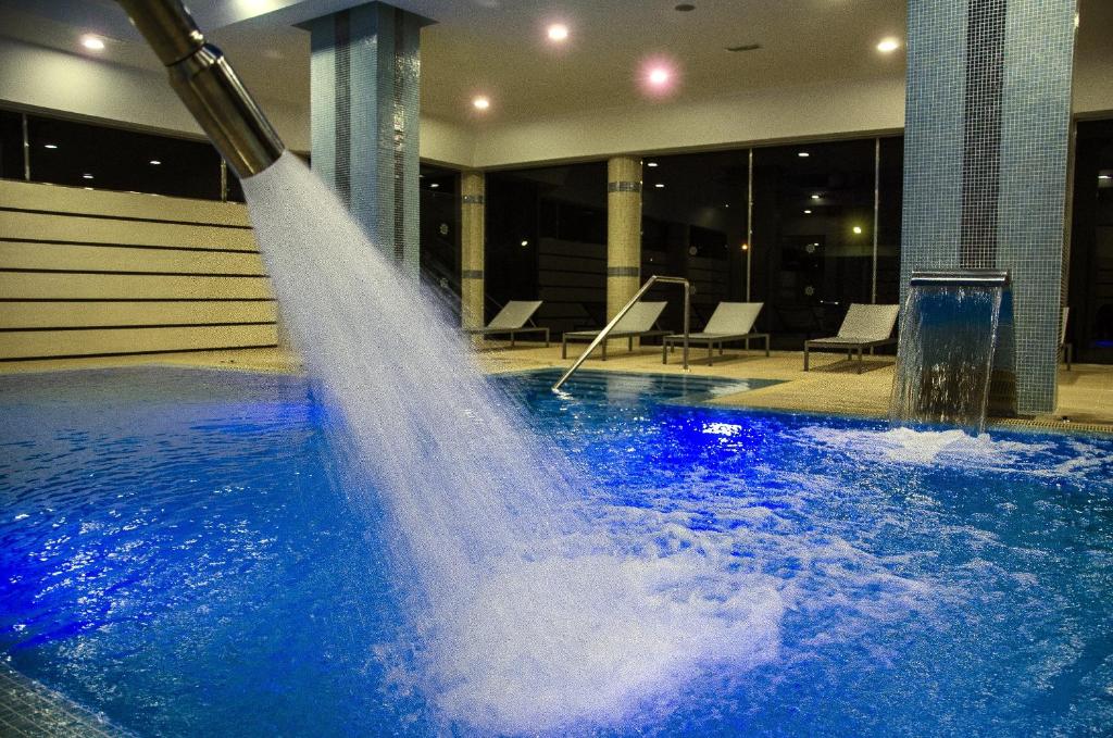 Bazén v ubytování Hotel Puerto Bahía & Spa nebo v jeho okolí