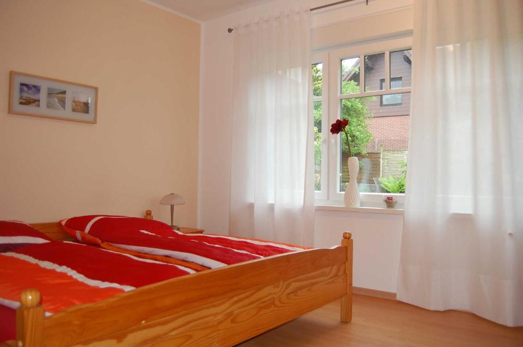 เตียงในห้องที่ Ferienwohnung_Beethovenstrasse