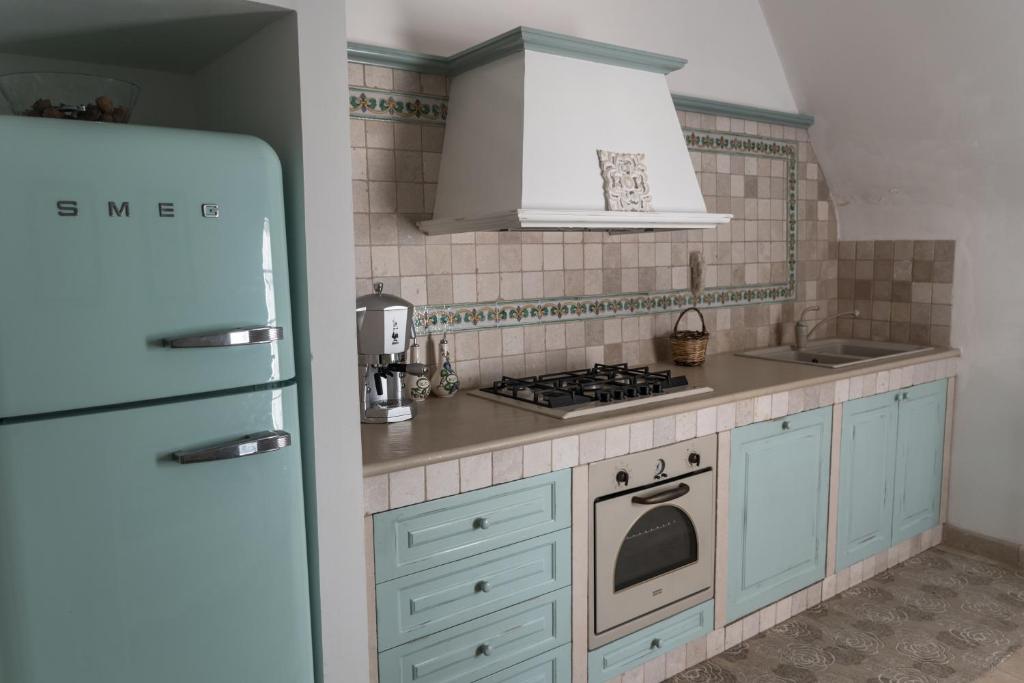 A kitchen or kitchenette at Masseria Luco