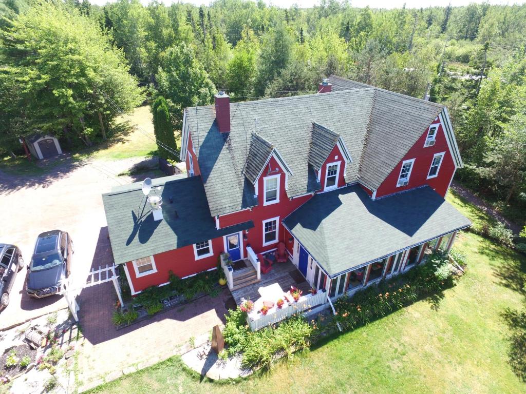an aerial view of a large red house at Little Shemogue Inn in Little Shemogue