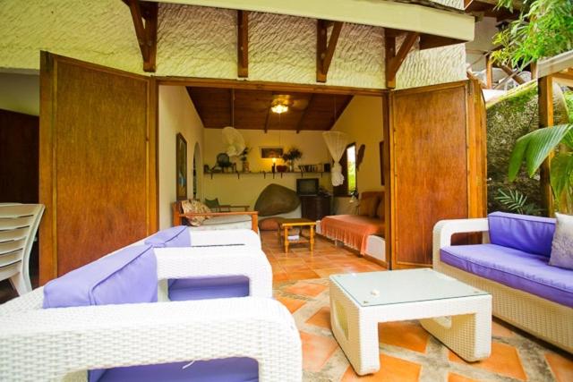 Posezení v ubytování Coté Sud - Unique Villa & Bungalows Intendance Road