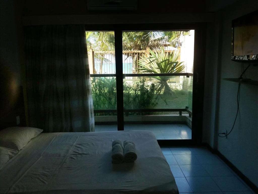  ES - Pé na areia em Ponta Negra