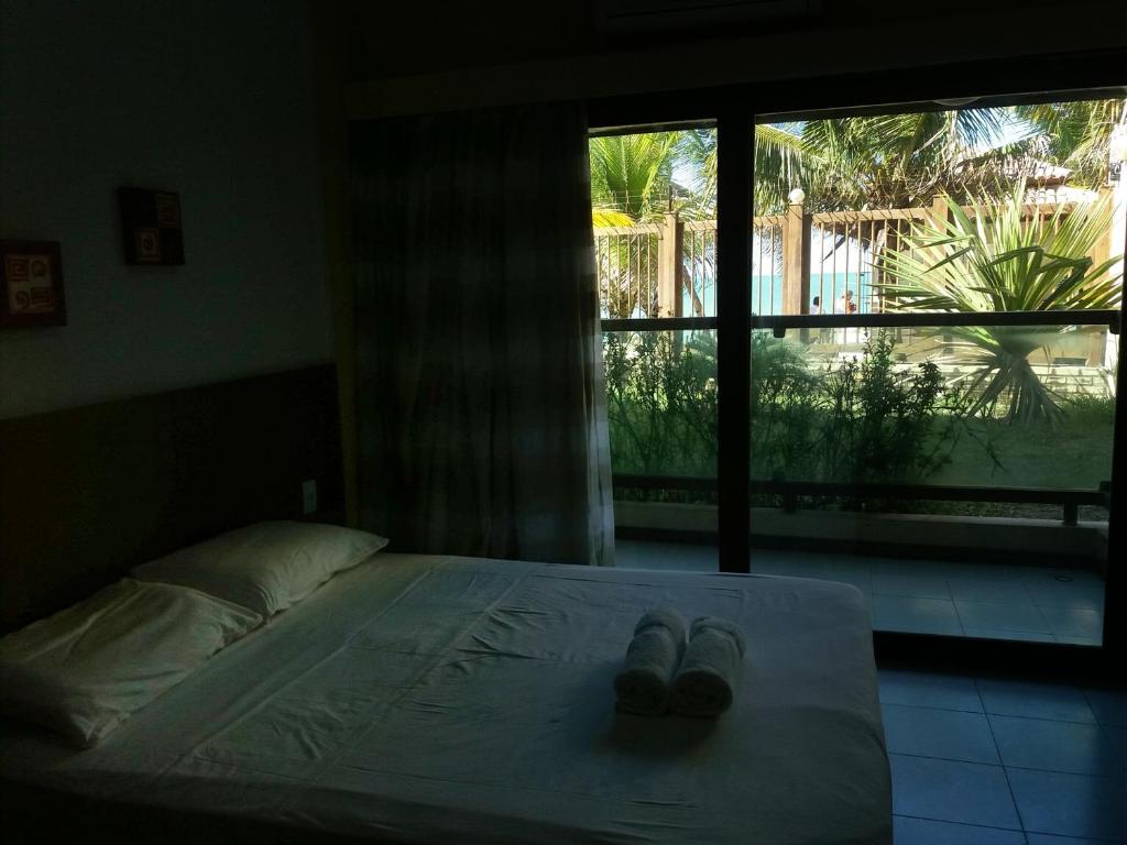  ES - Pé na areia em Ponta Negra