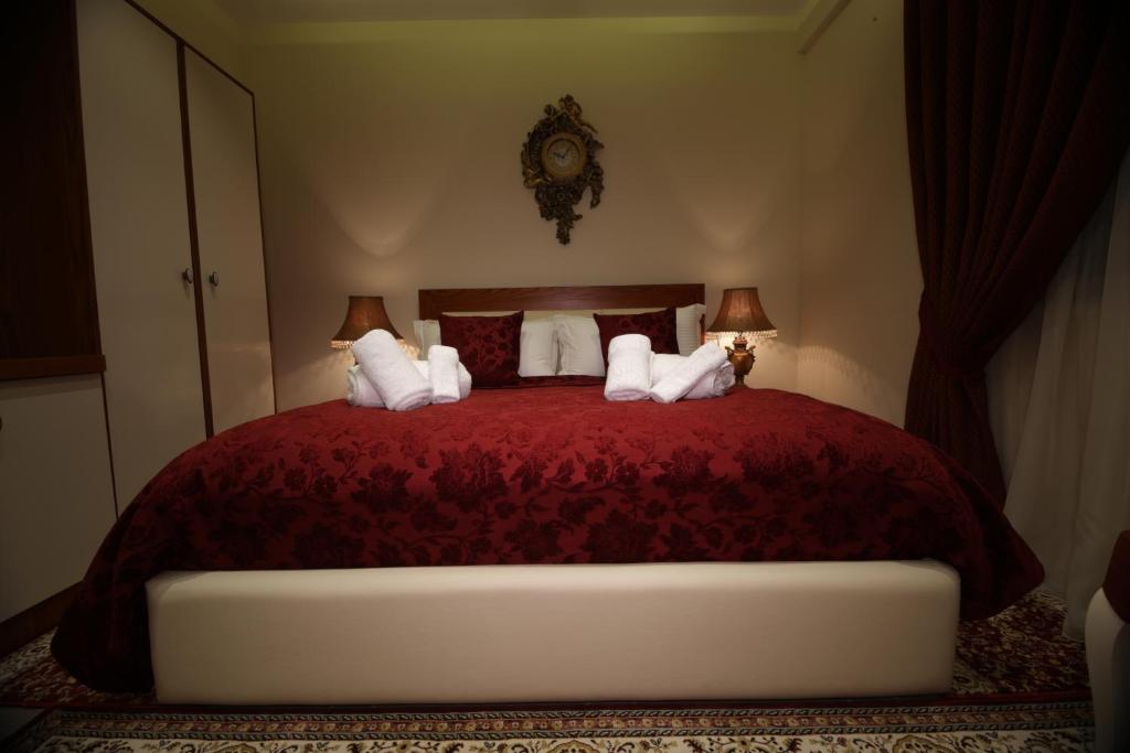 Postel nebo postele na pokoji v ubytování Vila Tako - Hotel