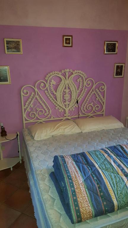 Postel nebo postele na pokoji v ubytování Podere Lo Stringaio