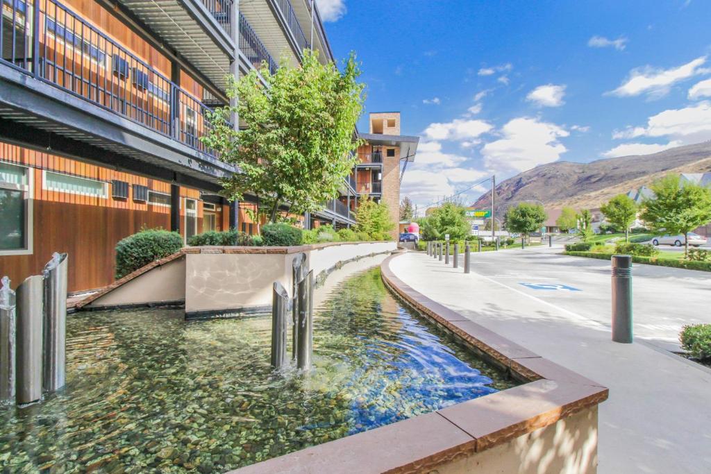 a street in a city with a body of water at Chelan Resort Suites 2 in Chelan