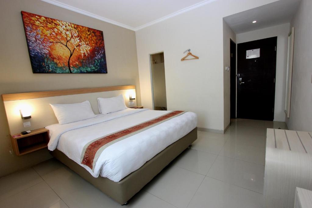 Letto o letti in una camera di Laxston Hotel