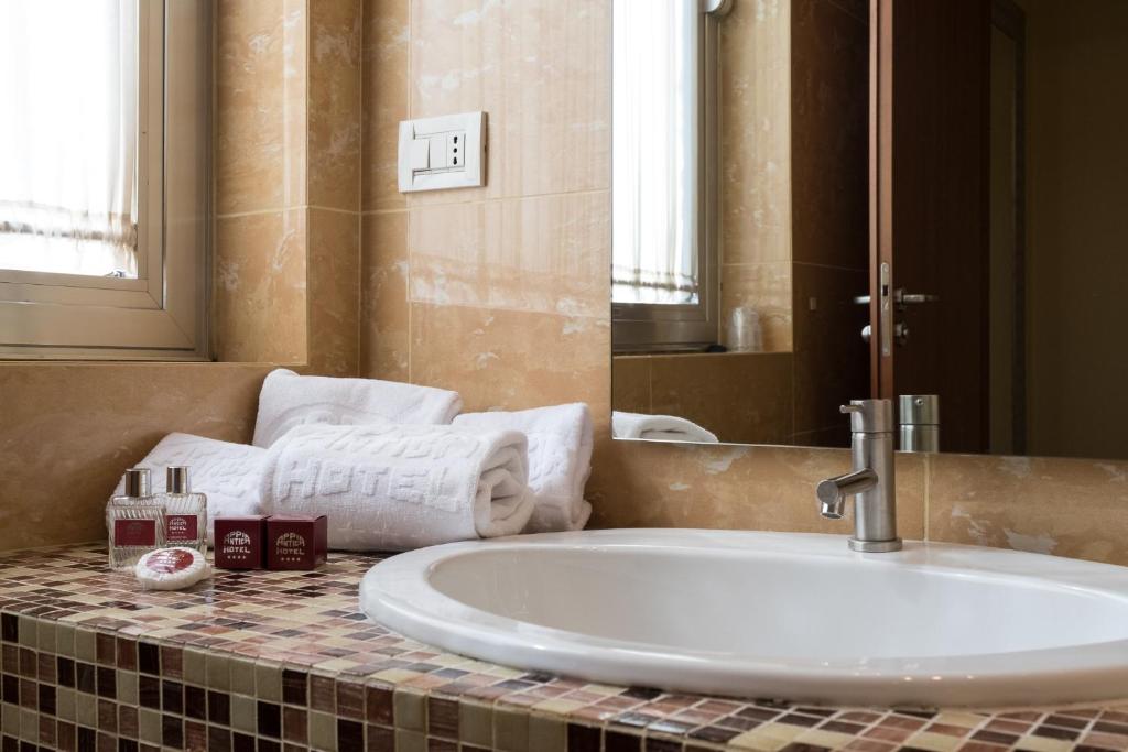Koupelna v ubytování Appia Antica Hotel