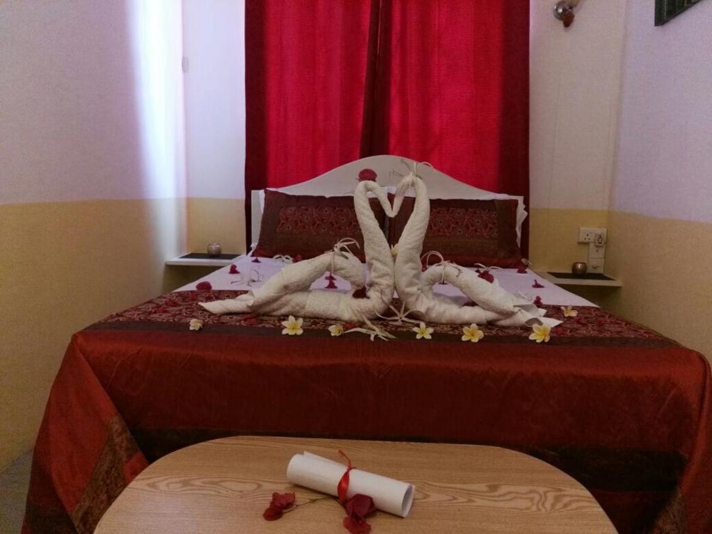 Postel nebo postele na pokoji v ubytování Eden Villa