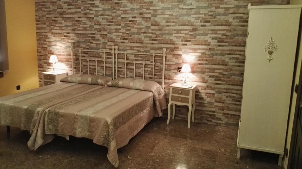 Posteľ alebo postele v izbe v ubytovaní Casa Tiburcio