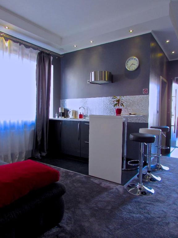 Kuchyň nebo kuchyňský kout v ubytování Hotel 108