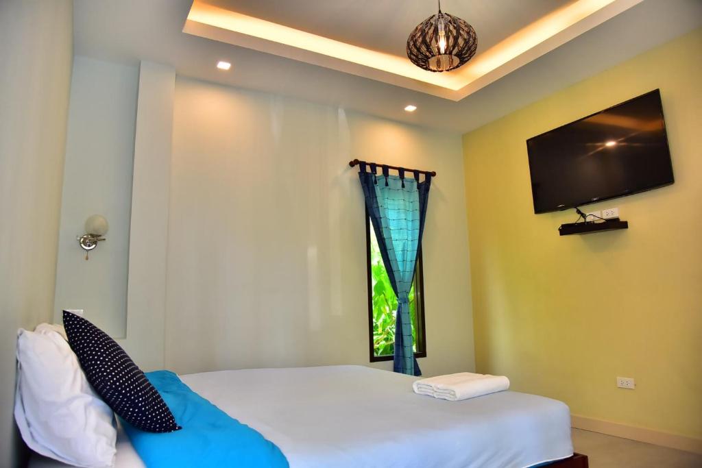 Letto o letti in una camera di The House at Pranburi