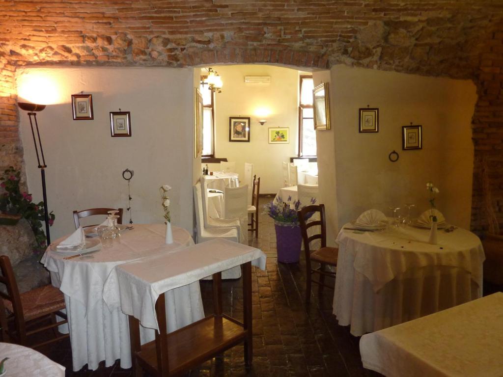 Postel nebo postele na pokoji v ubytování La Rocca