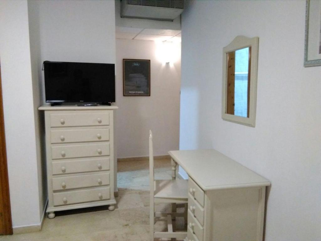 TV a/nebo společenská místnost v ubytování Hotel Balcón de Cazorla