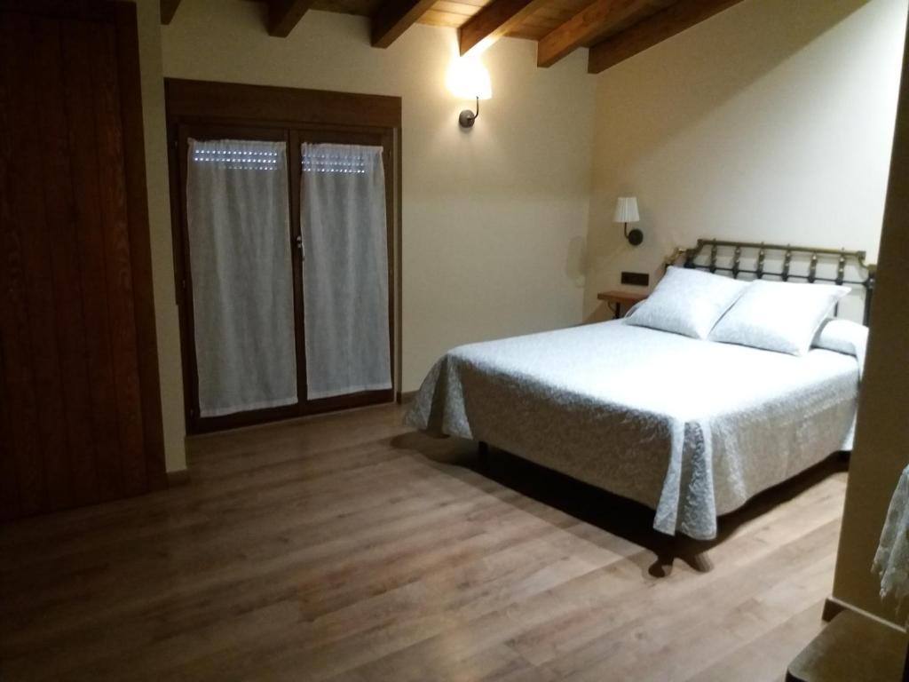 Postel nebo postele na pokoji v ubytování El Cobijo de los Arribes