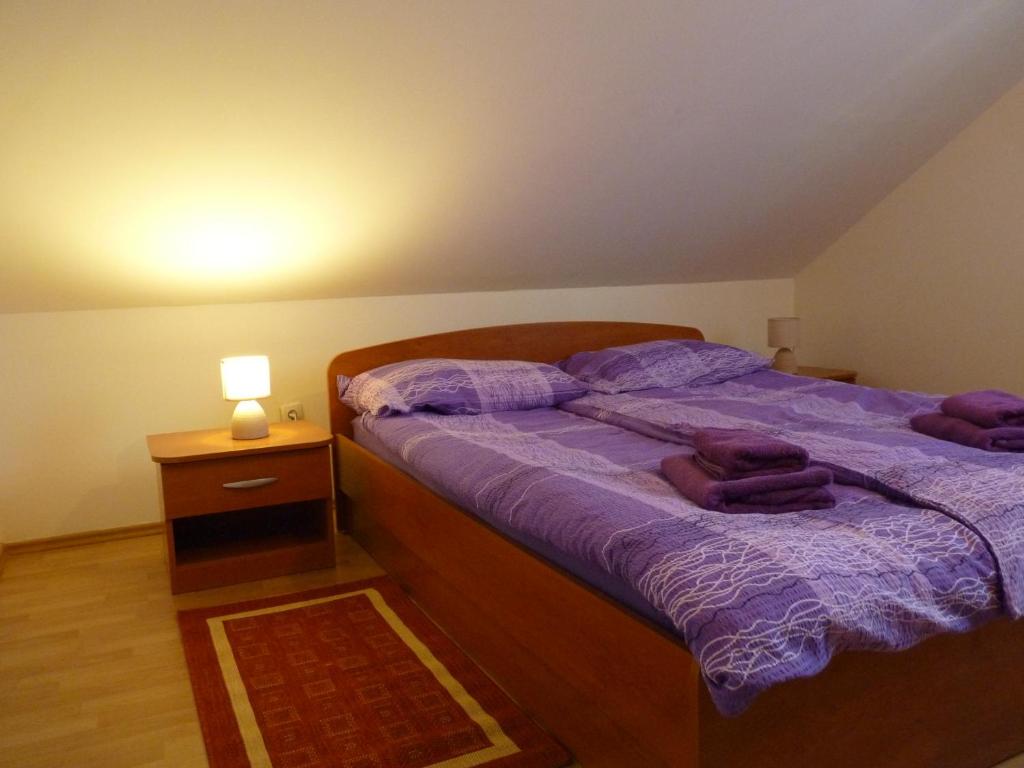 Posteľ alebo postele v izbe v ubytovaní Apartments Agrijan
