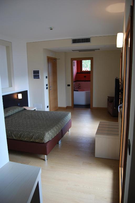 Postel nebo postele na pokoji v ubytování Albergo Ristorante Orazio