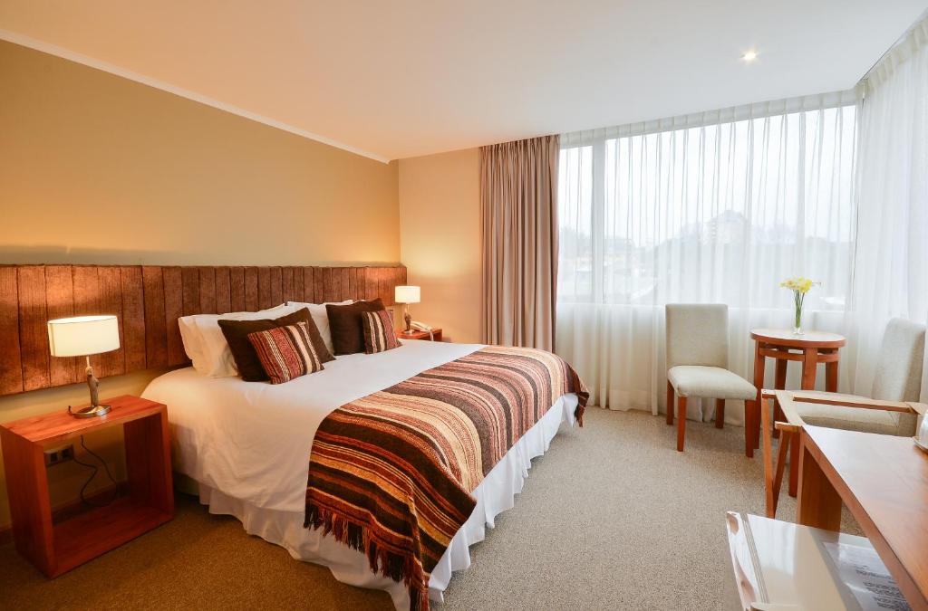 Postel nebo postele na pokoji v ubytování Hotel Terraza Suite
