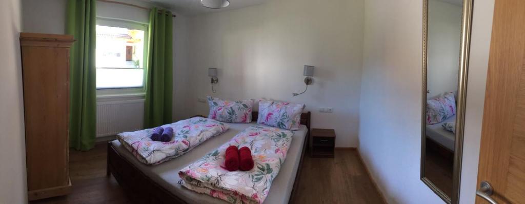 Postel nebo postele na pokoji v ubytování Haus Astner