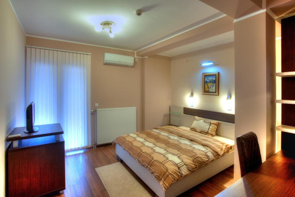 Postel nebo postele na pokoji v ubytování Guesthouse Vitez