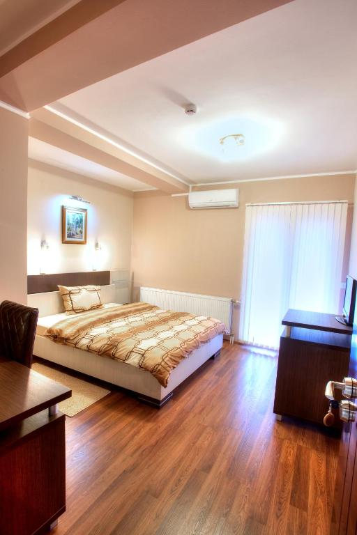 Postel nebo postele na pokoji v ubytování Guesthouse Vitez