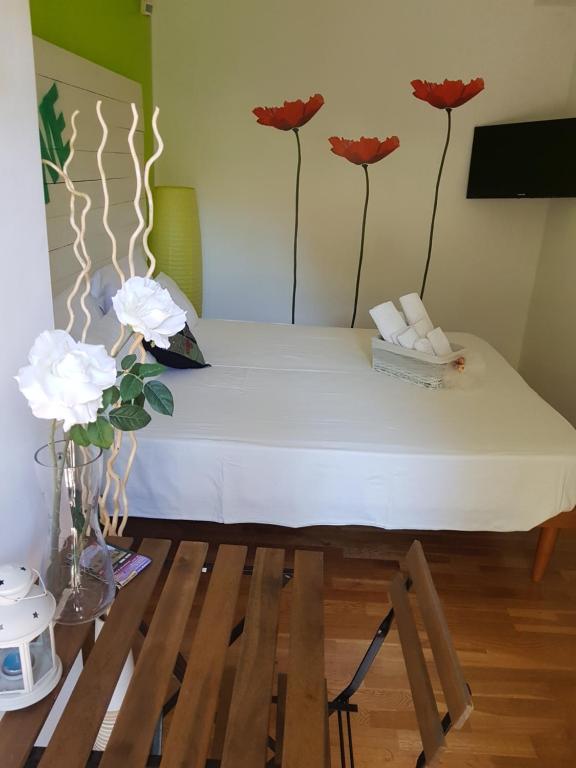Postel nebo postele na pokoji v ubytování B&B Albaluna