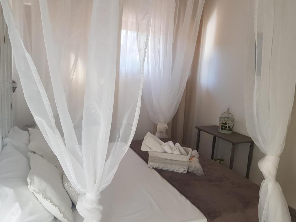 Postel nebo postele na pokoji v ubytování B&B Albaluna