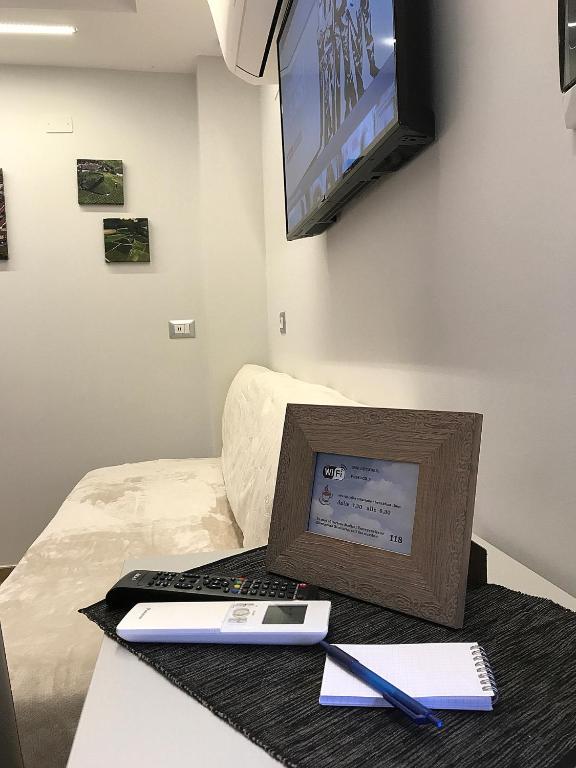 TV a/nebo společenská místnost v ubytování Casa Soave B&B