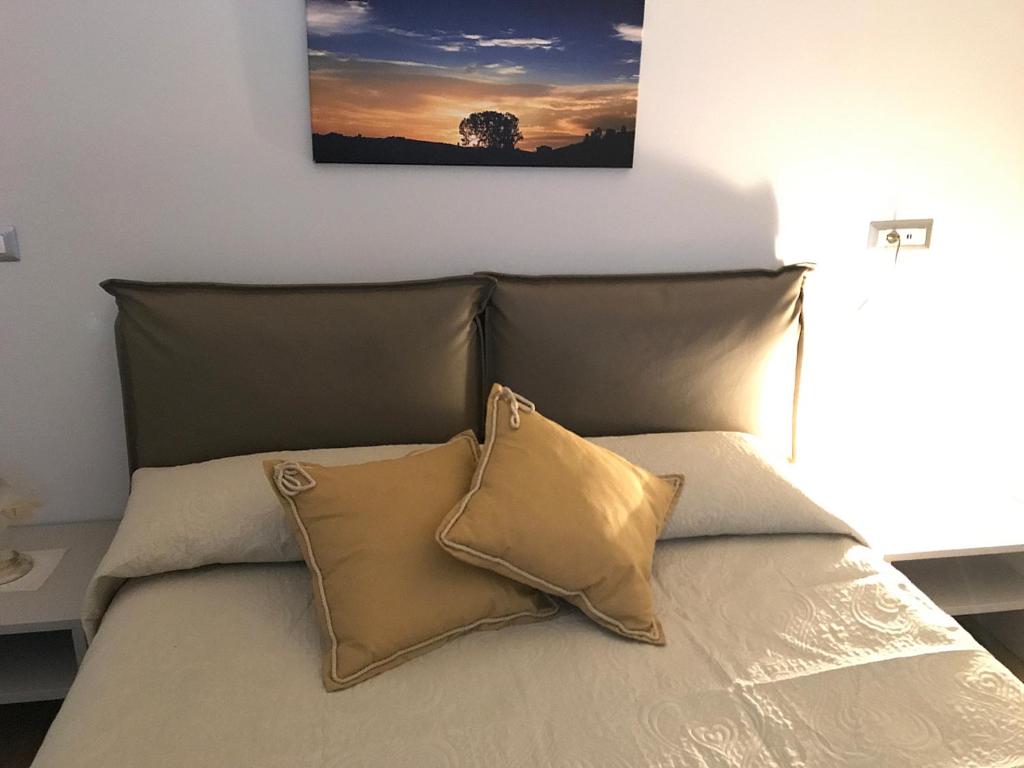 Postel nebo postele na pokoji v ubytování Casa Soave B&B