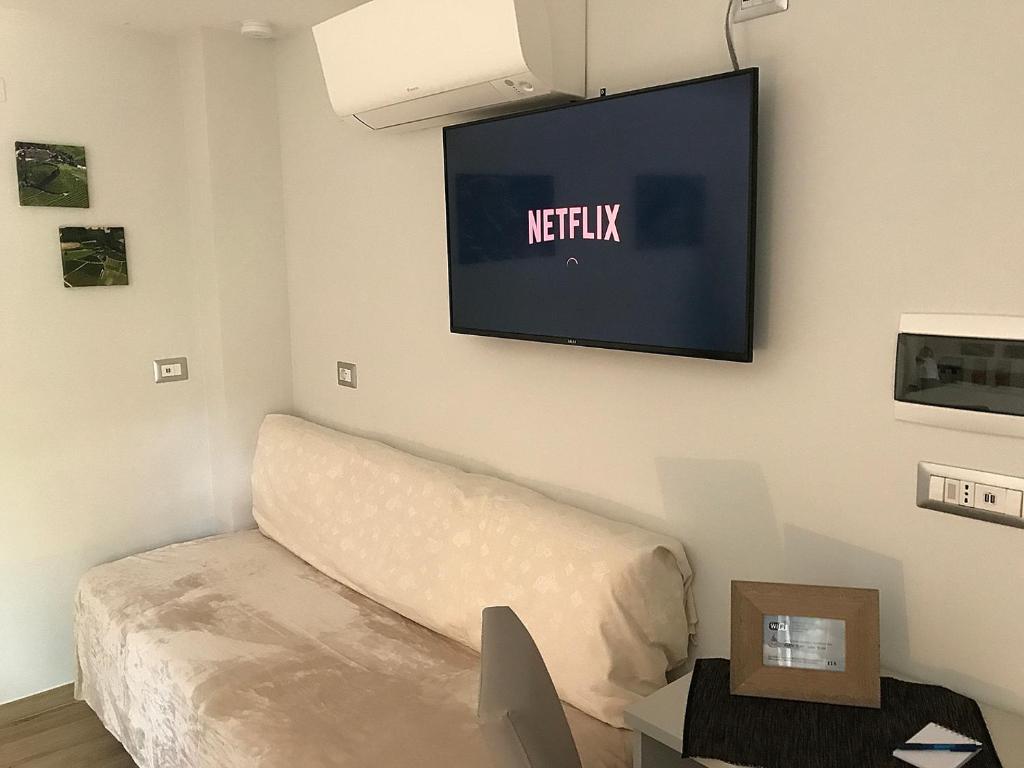 TV a/nebo společenská místnost v ubytování Casa Soave B&B