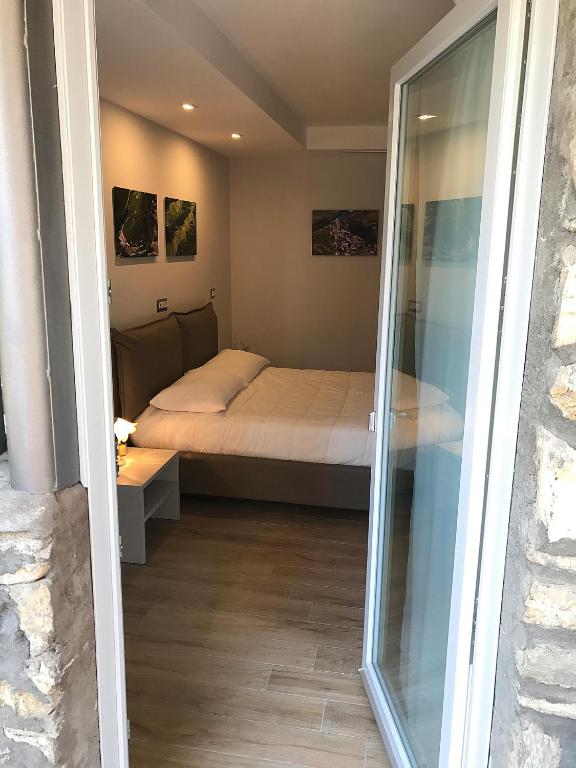 Postel nebo postele na pokoji v ubytování Casa Soave B&B