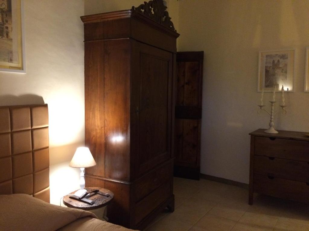 Postel nebo postele na pokoji v ubytování Ad Palatium