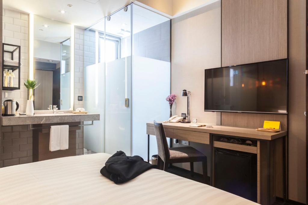 Kuchyň nebo kuchyňský kout v ubytování Changyu Hotel