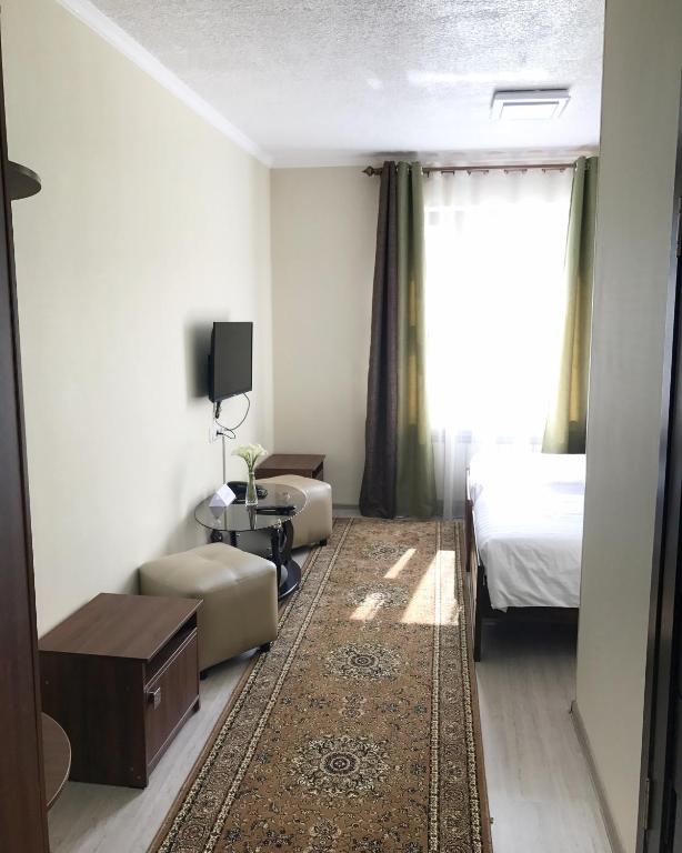 Postel nebo postele na pokoji v ubytování Nomad Hotel