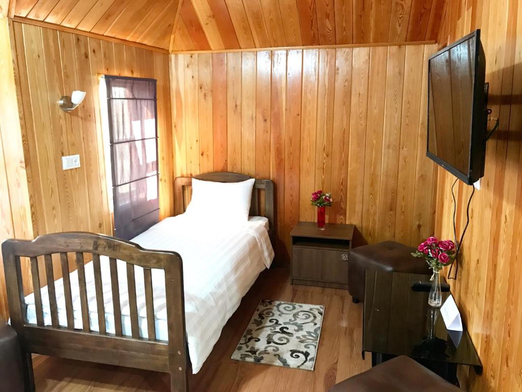 Postel nebo postele na pokoji v ubytování Nomad Hotel