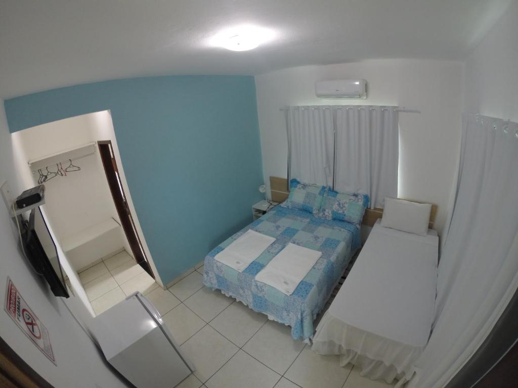 Postel nebo postele na pokoji v ubytování Cantinho da Melão