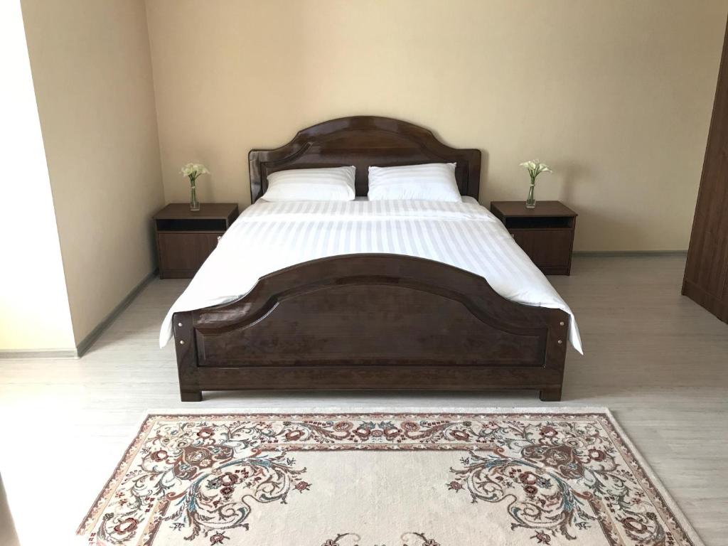 Postel nebo postele na pokoji v ubytování Nomad Hotel