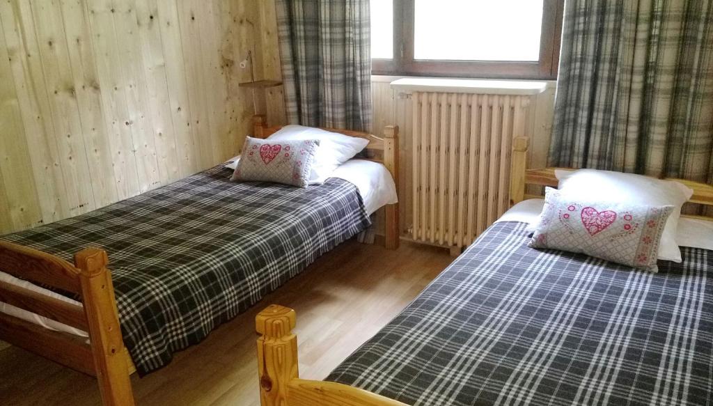 Letto o letti in una camera di Résidence Le Fontenay