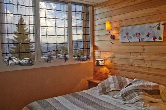 Letto o letti in una camera di Résidence Le Fontenay