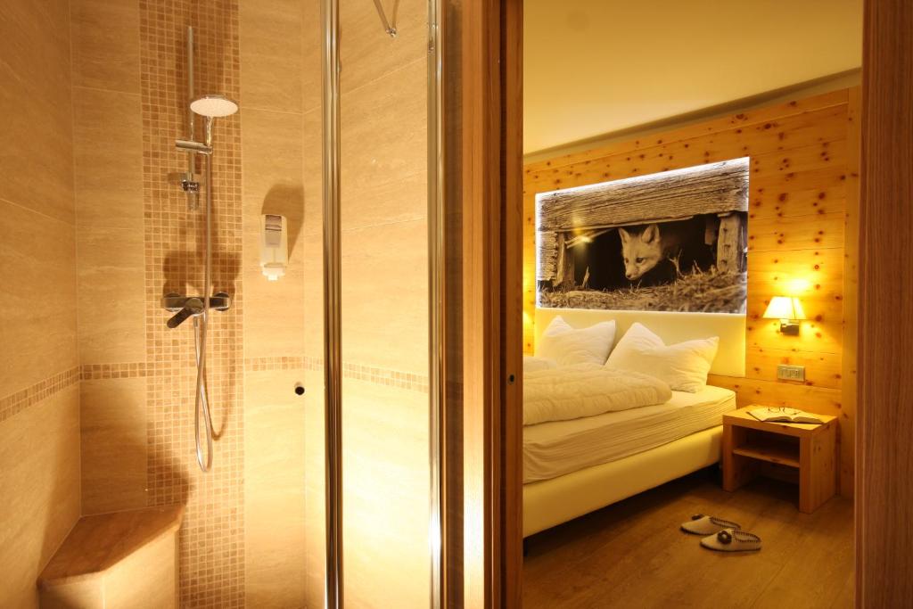 Postel nebo postele na pokoji v ubytování Hotel Pineta