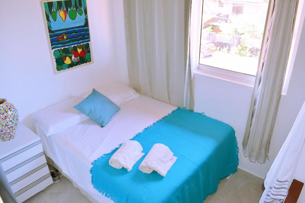 Duplex Solar Água tesisinde bir odada yatak veya yataklar