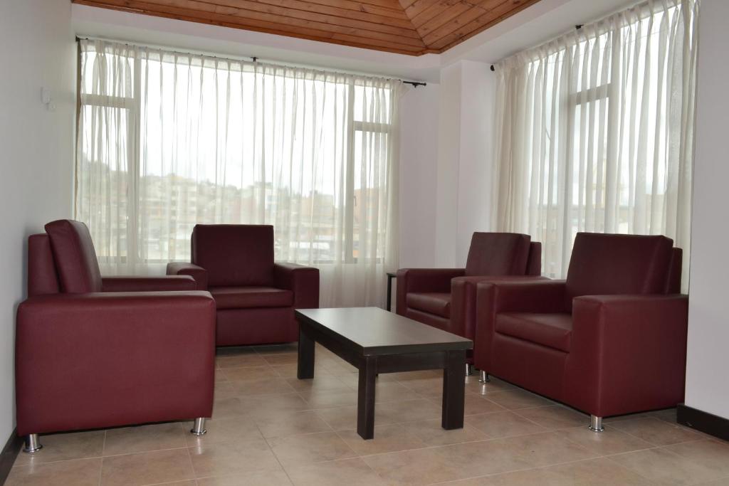 Posezení v ubytování Apartahotel Doble3