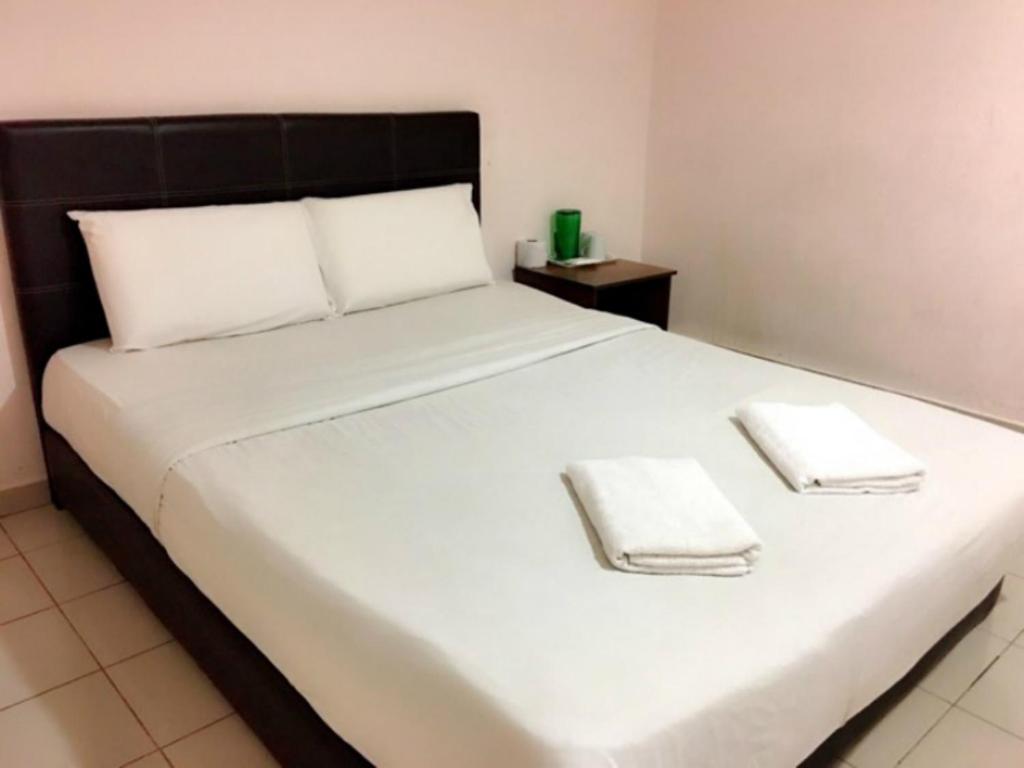 Postel nebo postele na pokoji v ubytování Venice Inn