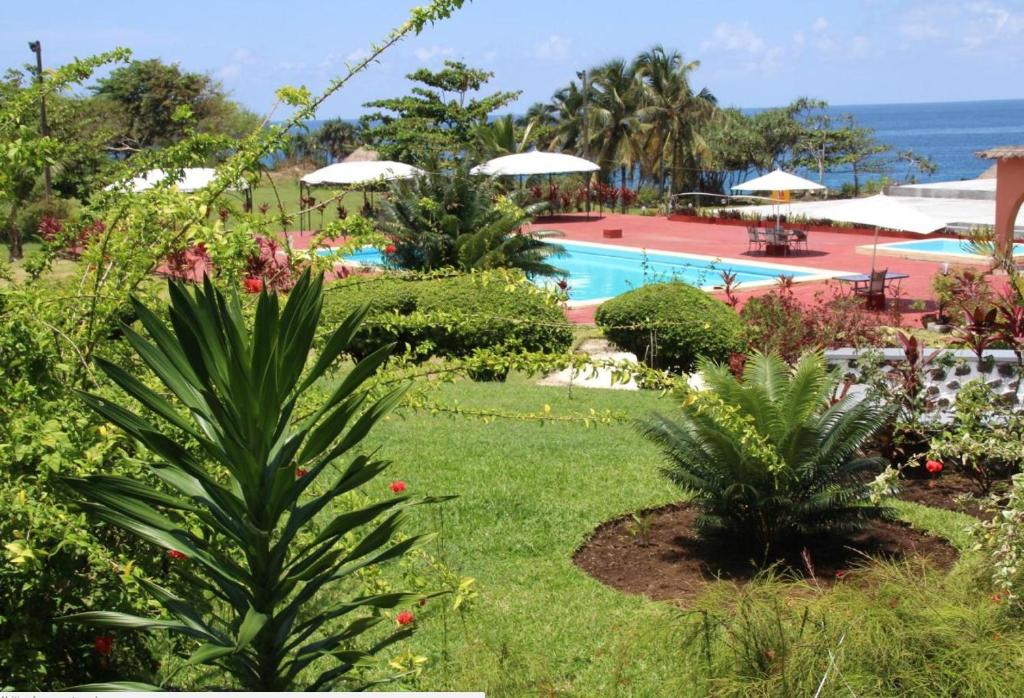 a view of the pool at a resort at Retaj Moroni in Moroni