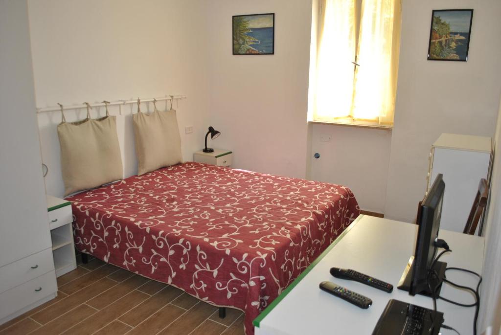 Postel nebo postele na pokoji v ubytování Camping Village Canapai